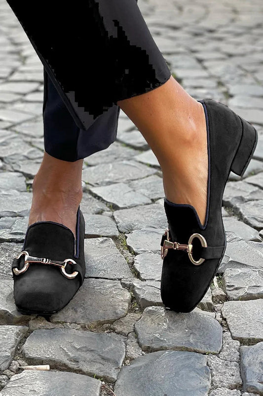 Black loafers with golden bit