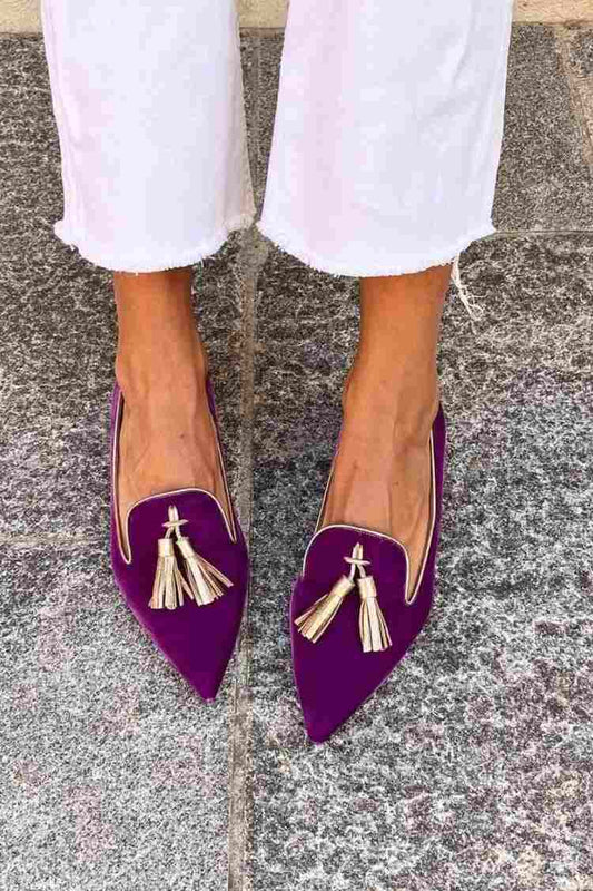 Loafer with elegant tassels